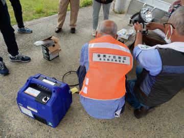 登美ヶ丘地区自主防災防犯会　防災備品の点検の様子